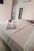 Triplo Econômico Térreo | Minibar, free WiFi, bed sheets