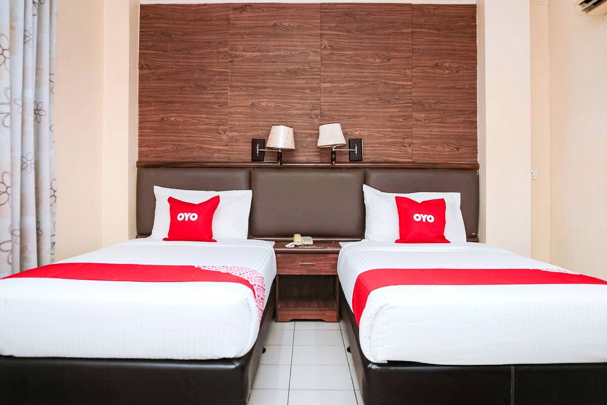 Habitación Deluxe con 2 camas individuales | Wifi gratis y ropa de cama