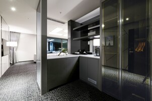 Suite junior | Zona de estar | Una televisión de pantalla plana