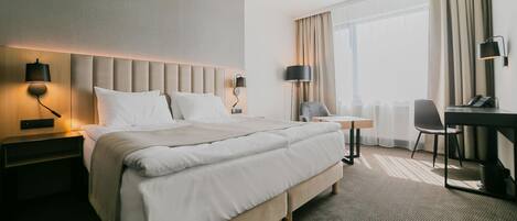 Hypo-allergenic bedding, in-room safe, desk, laptop workspace