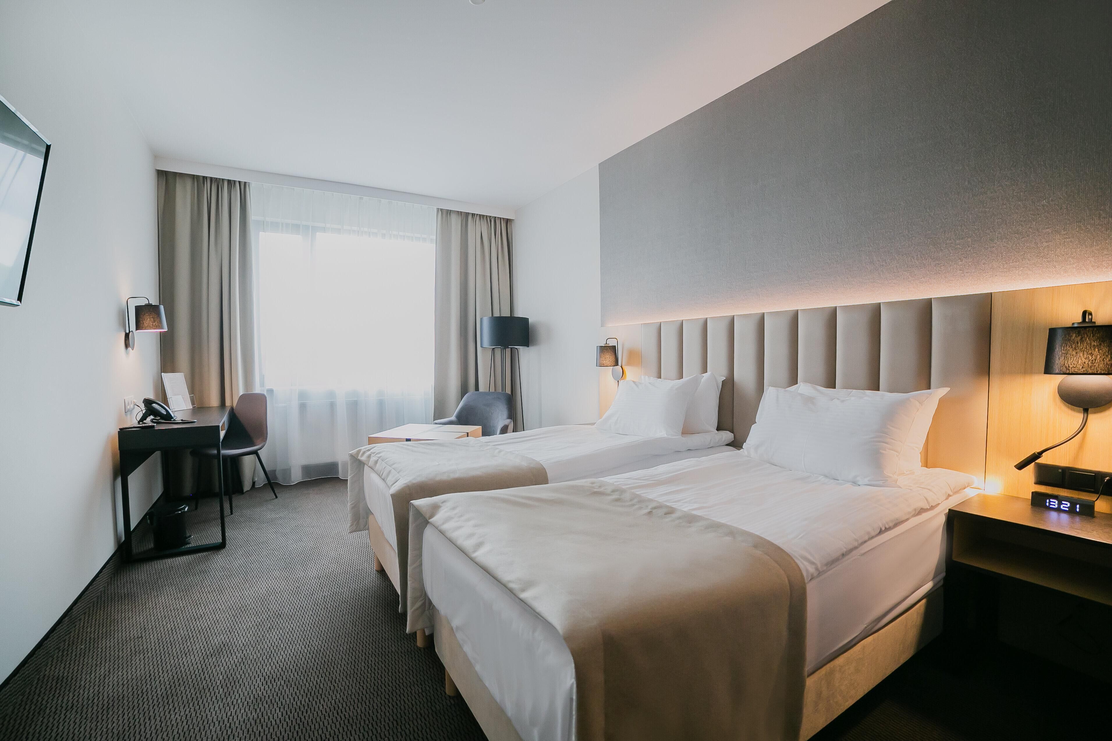 Hypo-allergenic bedding, in-room safe, desk, laptop workspace