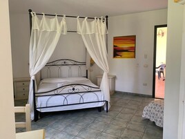 Minibar, desk, bed sheets