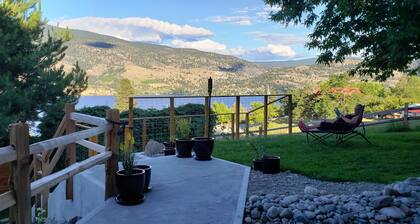 Lake views, backyard oasis, minute from beach, private, late-century modern home
