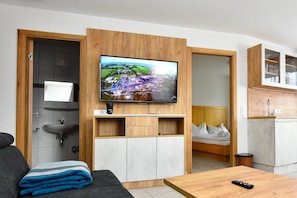 Appartement, 2 chambres, sauna, vue montagne | Coin séjour