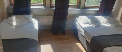 Studio | 1 bedroom, desk, blackout curtains, iron/ironing board