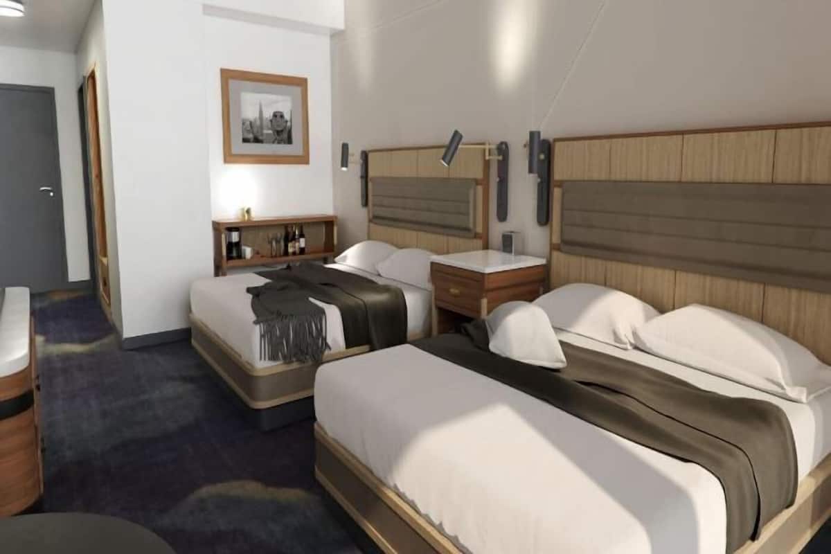 Hypo-allergenic bedding available, pillowtop beds, in-room safe, desk