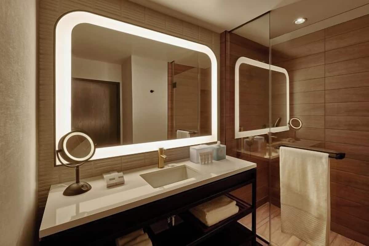 Designer toiletries, hair dryer, towels, soap