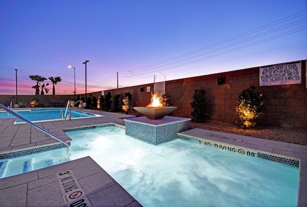 Outdoor pool, open 9:00 AM to 10:00 PM, pool umbrellas, pool loungers
