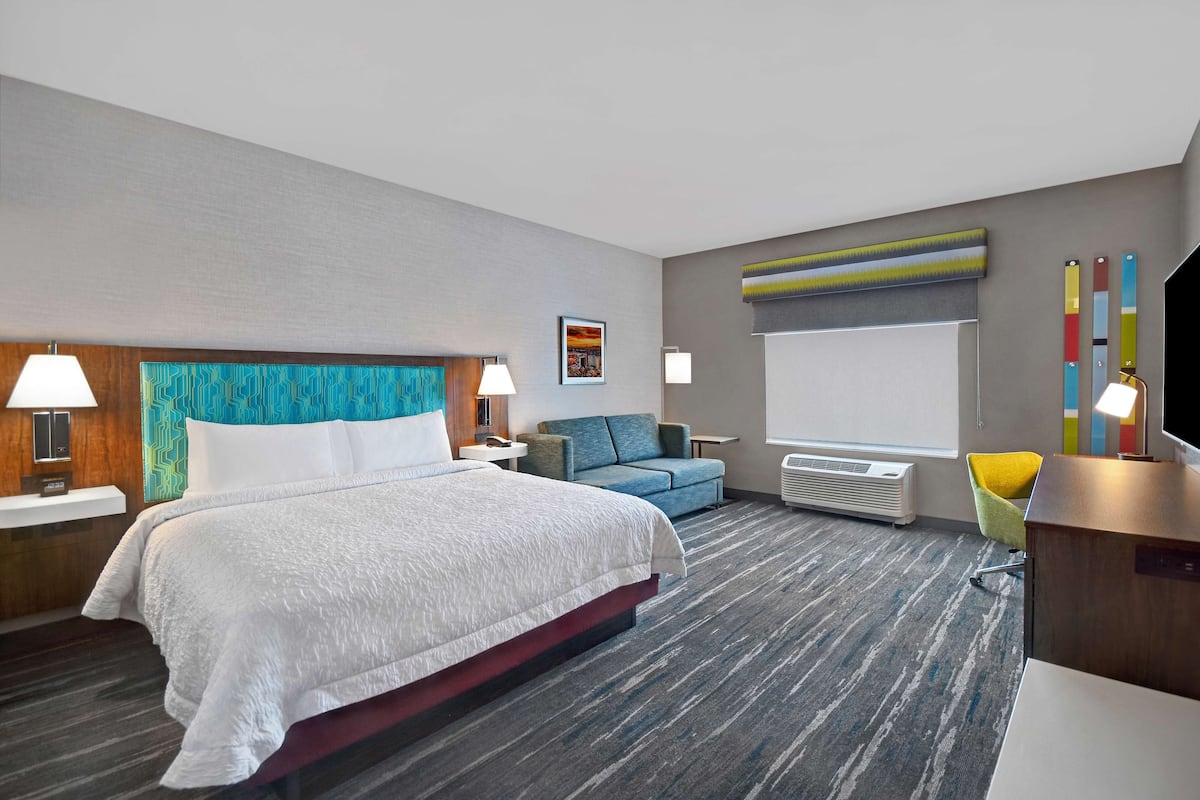 room, 1 king bed, refrigerator & microwave | down duvets, blackout curtains, iron/ironing board