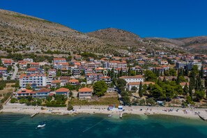 On the beach - Fantastic beachfront apartment with private balcony on the Adriatic.Top location (Seget Donji)