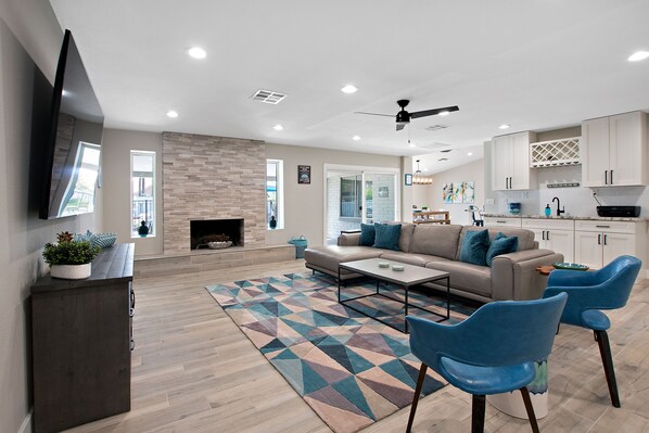 Smart TV, fireplace, books