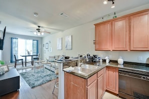 Fridge, coffee/tea maker, cookware/dishes/utensils