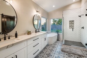 Combined shower/tub, hair dryer, towels, soap