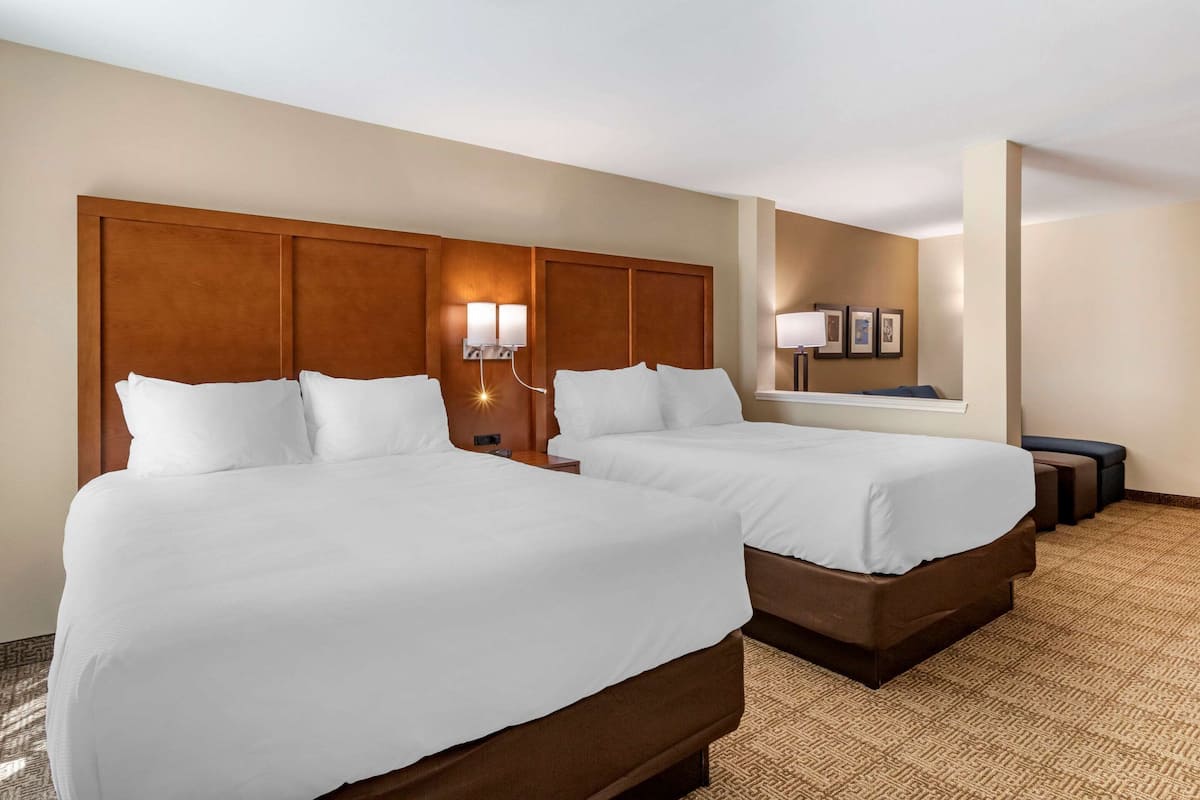 Suite, Multiple Beds, Non Smoking | 1 bedroom, pillow-top beds, desk, iron/ironing board