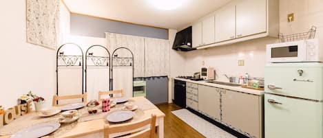 Fridge, microwave, stovetop, cookware/dishes/utensils