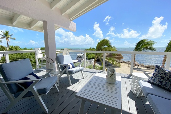 Breezy beachfront from 2nd floor deck overlooking the ocean