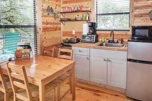 Fridge, microwave, stovetop, coffee/tea maker