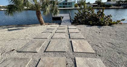 Blue Heron House | Private 4 BR Waterfront w/ Heated Pool and Fire Pit