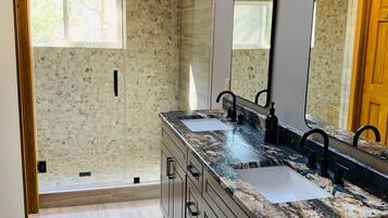 Combined shower/tub, hair dryer, towels, soap