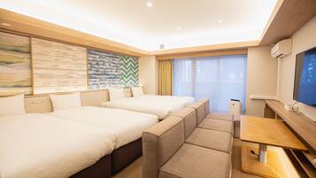 Comfort Quadruple Room | Down comforters, in-room safe, blackout drapes, iron/ironing board