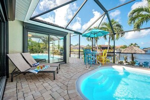 A heated pool, pool umbrellas
