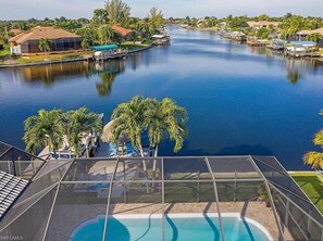 A heated pool, pool umbrellas