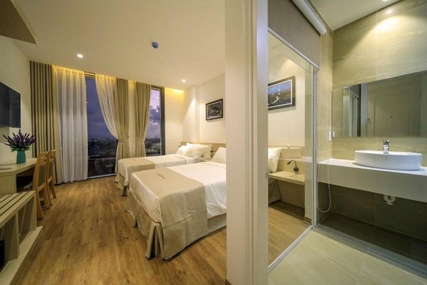 Luxury Triple Room | Minibar, in-room safe, individually furnished, desk