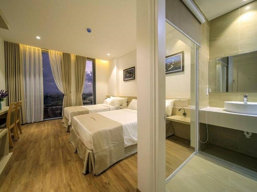 Luxury Triple Room | Minibar, in-room safe, individually furnished, desk