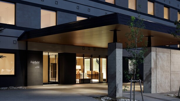 A modern hotel entrance with a covered walkway, large windows, and a visible reception area. - Fairfield by Marriott Kyoto Kyotamba (Kyotanba)