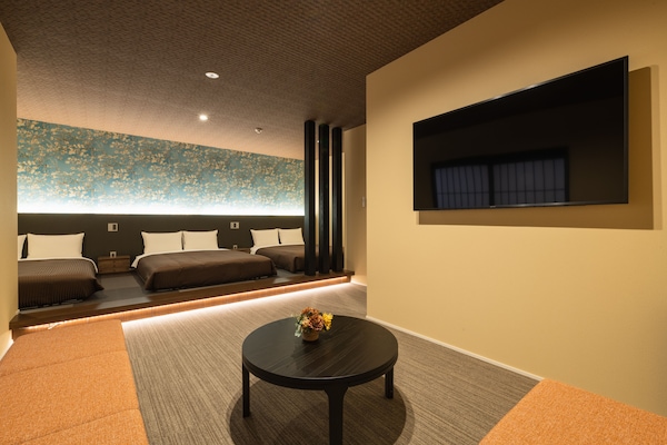 Superior B Non-Smoking | Living area | Flat-screen TV