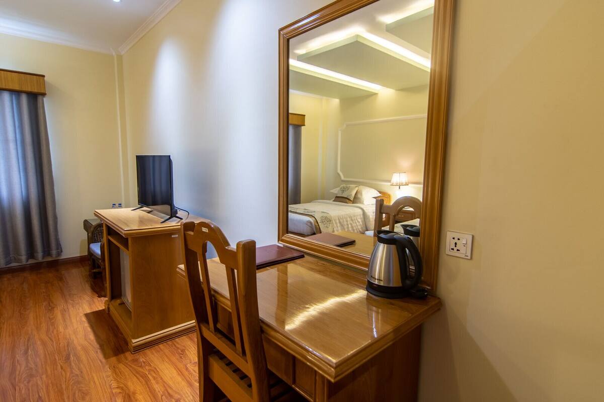 Habitación Deluxe con 1 cama doble o 2 individuales | Servicio de la habitación