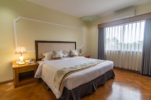 Habitación Deluxe con 1 cama doble o 2 individuales | Wifi gratis y ropa de cama