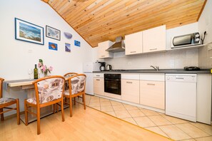 Fridge, microwave, toaster, cookware/dishes/utensils
