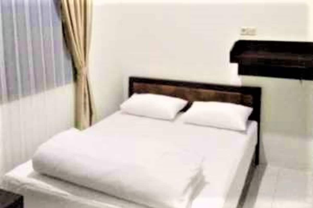 Kamar Standar | Wi-Fi gratis dan seprai linen