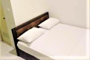Kamar Standar | Wi-Fi gratis dan seprai linen