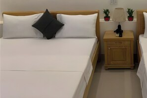 Habitación familiar, 2 camas Queen size | Insonorización, wifi gratis y ropa de cama 