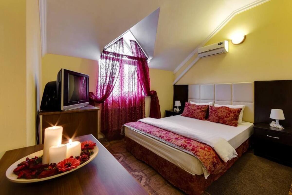 Superior kamer, 1 twee- of 2 eenpersoonsbedden | Een minibar, een kluis op de kamer, een bureau