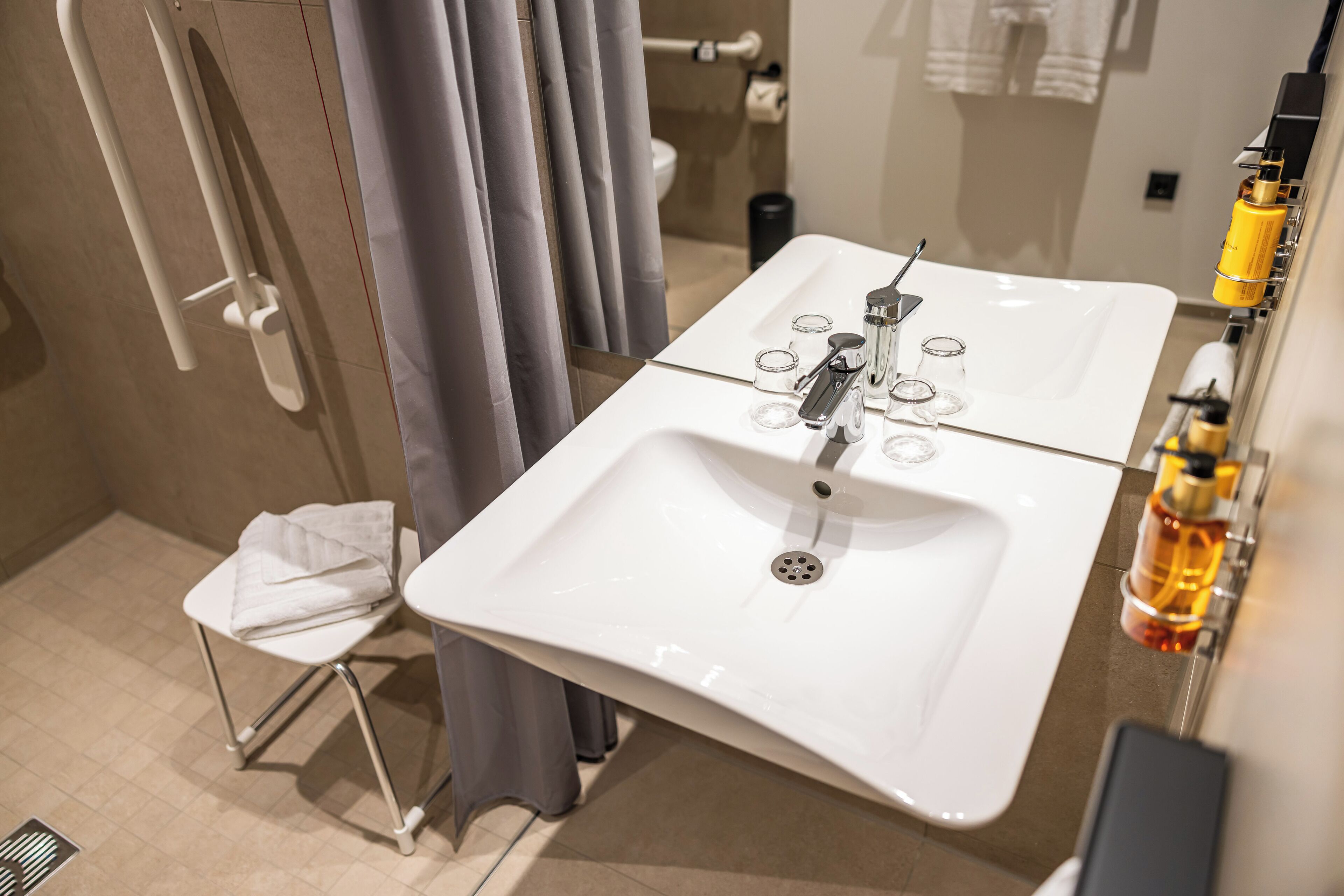 standard double room | bathroom | shower, hair dryer, towels, soap