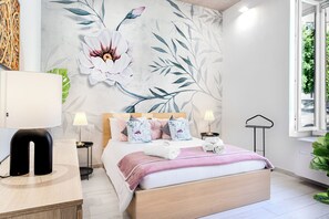 2 chambres, coffres-forts dans les chambres, fer et planche à repasser