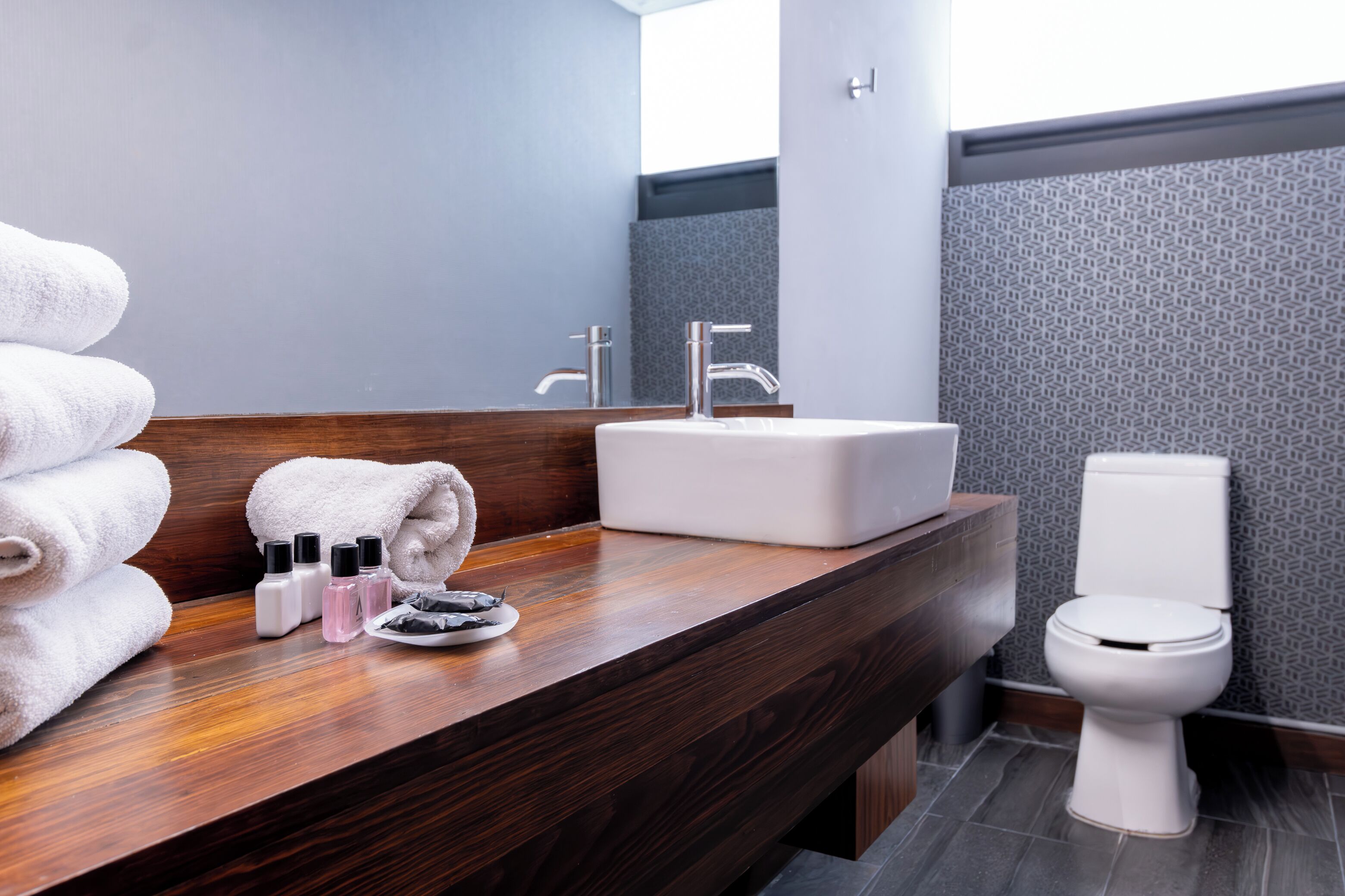 superior suite | bathroom | shower, free toiletries, hair dryer, towels