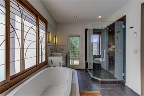 Combined shower/bathtub, towels, soap, shampoo