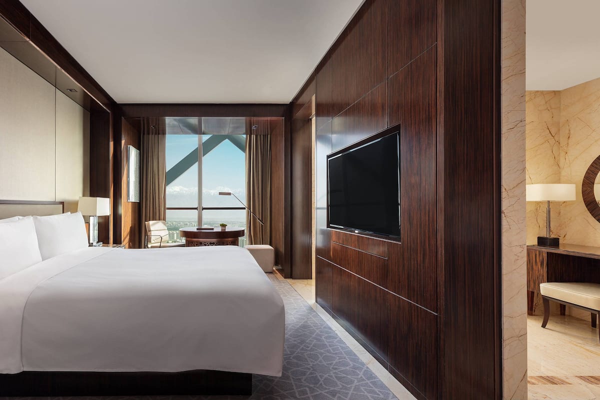Luxe beddengoed, donzen dekbedden, pillowtop-bedden, een minibar
