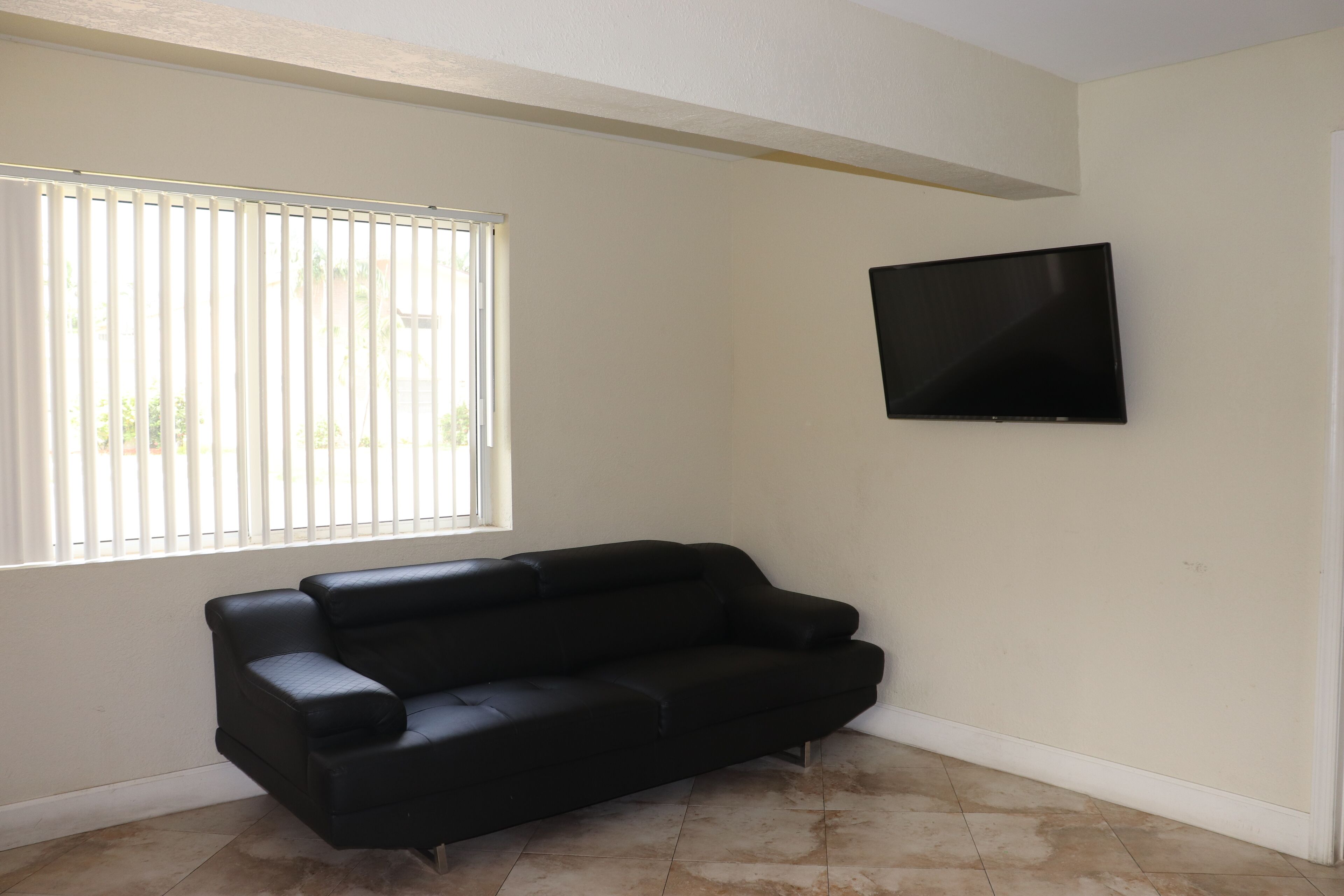 family apartment | living room | 42-inch lcd tv with cable channels, tv
