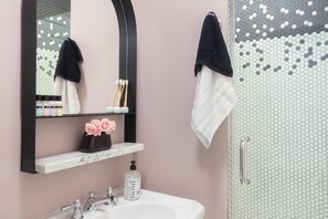 Hair dryer, towels, soap, shampoo