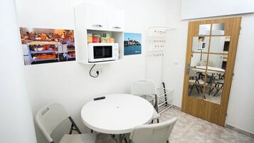 Junior Quadruple Room | Blackout drapes, soundproofing, free WiFi, bed sheets