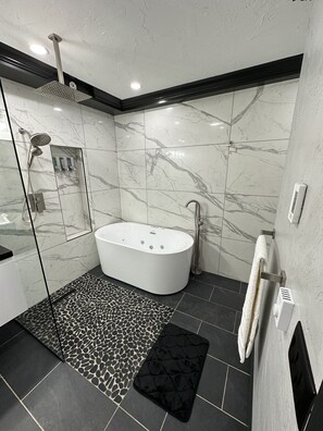 Jetted bath, hair dryer, towels, soap