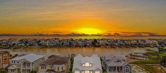 Luxurious Sunset Beach Home On The Water With Pool, Boat Dock and Golf Cart