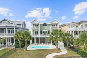 Exterior - Luxurious Sunset Beach Home On The Water With Pool, Boat Dock and Golf Cart (Sunset Beach)