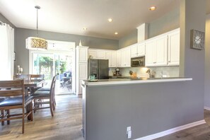 Coffee/tea maker, spices, dining tables