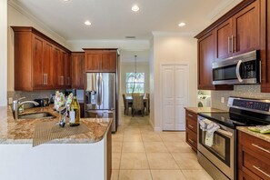 Fridge, microwave, oven, stovetop - New Vacation Home with Private Heated pool! - Villa Cordia - Roelens Vacations (Cape Coral)